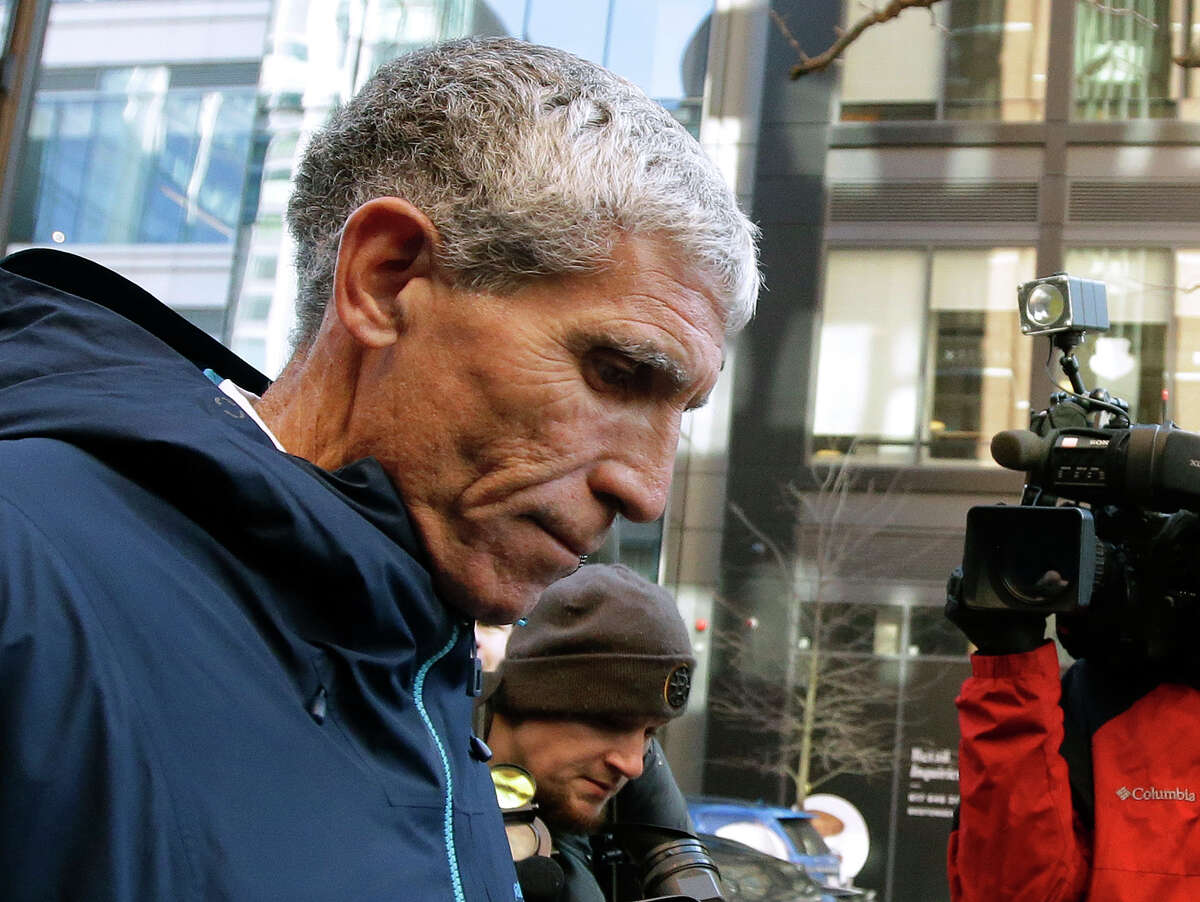 THE FOUNDER California businessman William "Rick" Singer founder of the Edge College & Career Network, departs federal court in Boston on Tuesday, March 12, 2019, after he pleaded guilty to charges in a nationwide college admissions bribery scandal