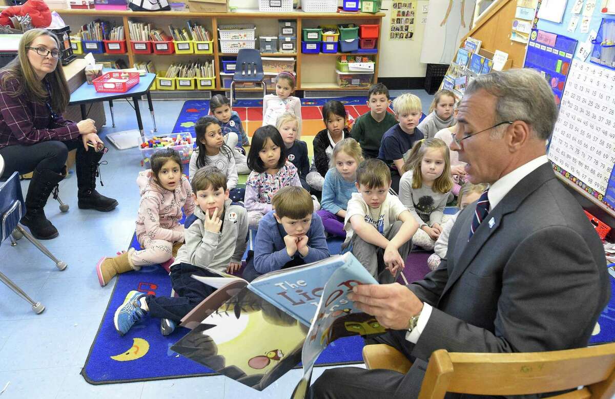 State Representative Fred Camillo (R-CT 151st District) reads "The Lion Inside" by Rachel Bright to Missy Gilson's first grade class during Old Greenwich School's 2nd annual World Read Aloud Day (WRAD) event on Friday, Feb. 1, 2019 in Greenwich, Connecticut.