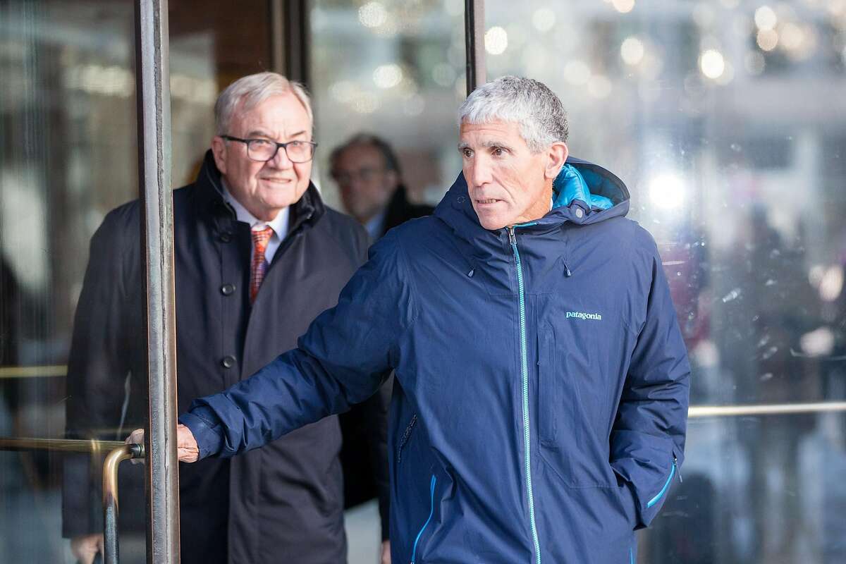 BOSTON, MA - MARCH 12: William "Rick" Singer leaves Boston Federal Court after being charged with racketeering conspiracy, money laundering conspiracy, conspiracy to defraud the United States, and obstruction of justice on March 12, 2019 in Boston, Massa