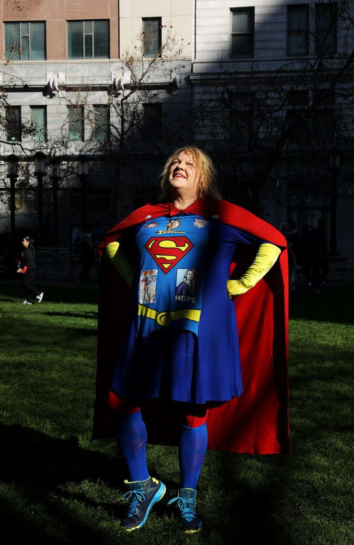 Shawn Sunshine Strickland, also known as Supergirl of San Francisco, poses for a portrait following Senator Kamala Harris's speech at the Frank Ogawa Plaza in Oakland, Calif., on Sunday, January 27, 2019. Harris officially launched her presidential campaign with a rally in her hometown of Oakland. "I heard her message of unity. She was calling for real unity like, she said, 'We can't have unity for the sake of unity. We have to call out the problems first,'" Strickland said. "That was so impressive to hear that. And she said 'We need to speak the real truth, actual truths,' and that's so important too 'cause there's so many groups trying to divide us and keep us apart and make us hate each other and distrust each other. I think she is the right candidate to bring us together."