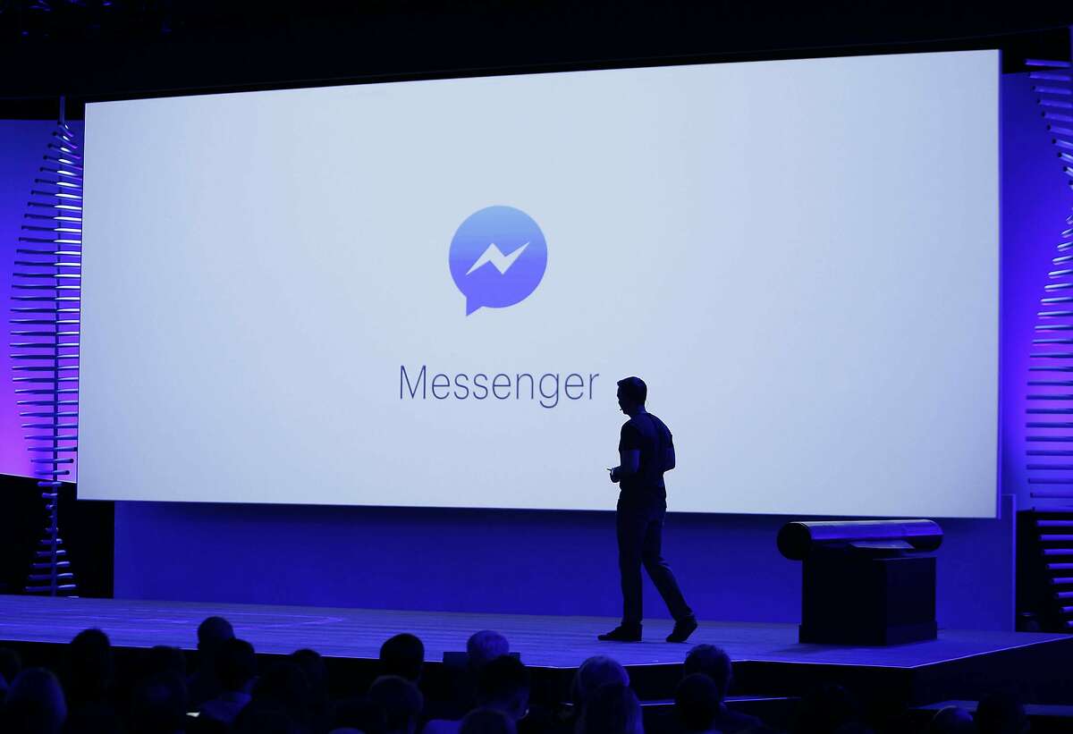 FILE - In this April 12, 2016, file photo, new features of Messenger are displayed during the keynote address at the F8 Facebook Developer Conference in San Francisco. Facebook is already the leader in enabling you to share photos, videos and links. It now wants to be a force in messaging, commerce, payments and just about everything else you do online. (AP Photo/Eric Risberg, File)