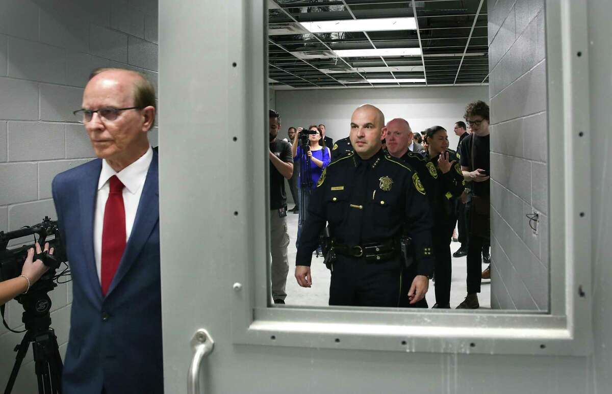Bexar County Judge Nelson Wolff, left, Sheriff Javier Salazar, right, and other county officials toured the new Bexar County Justice Intake and Assessment Center which has been built next to the Bexar County Jail, on Friday, April 13, 2018.