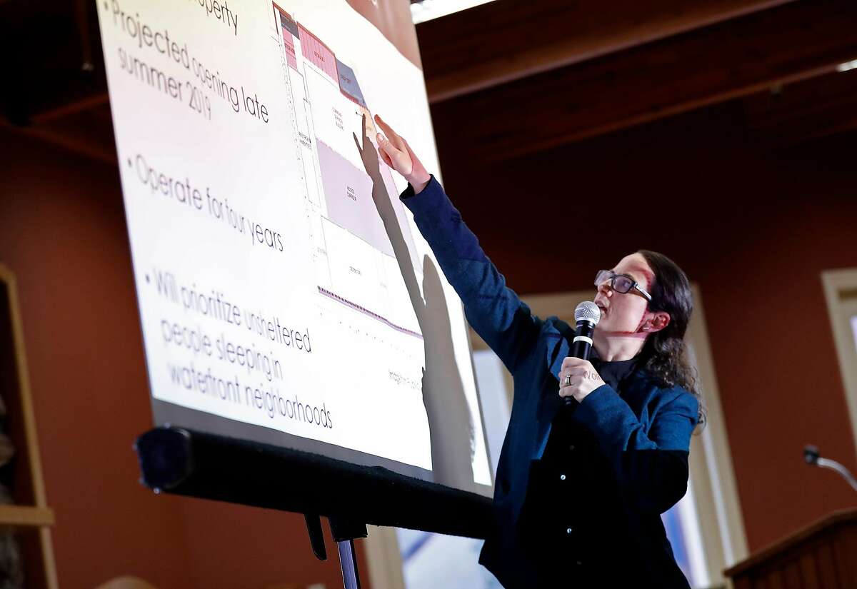 Emily Cohen, Homelessness Policy Advisor , points out the proposed site during Embarcadero SAFE Navigation Center informational meeting at Delancey Street Foundation in San Francisco, Calif., on Tuesday, March 12, 2019.