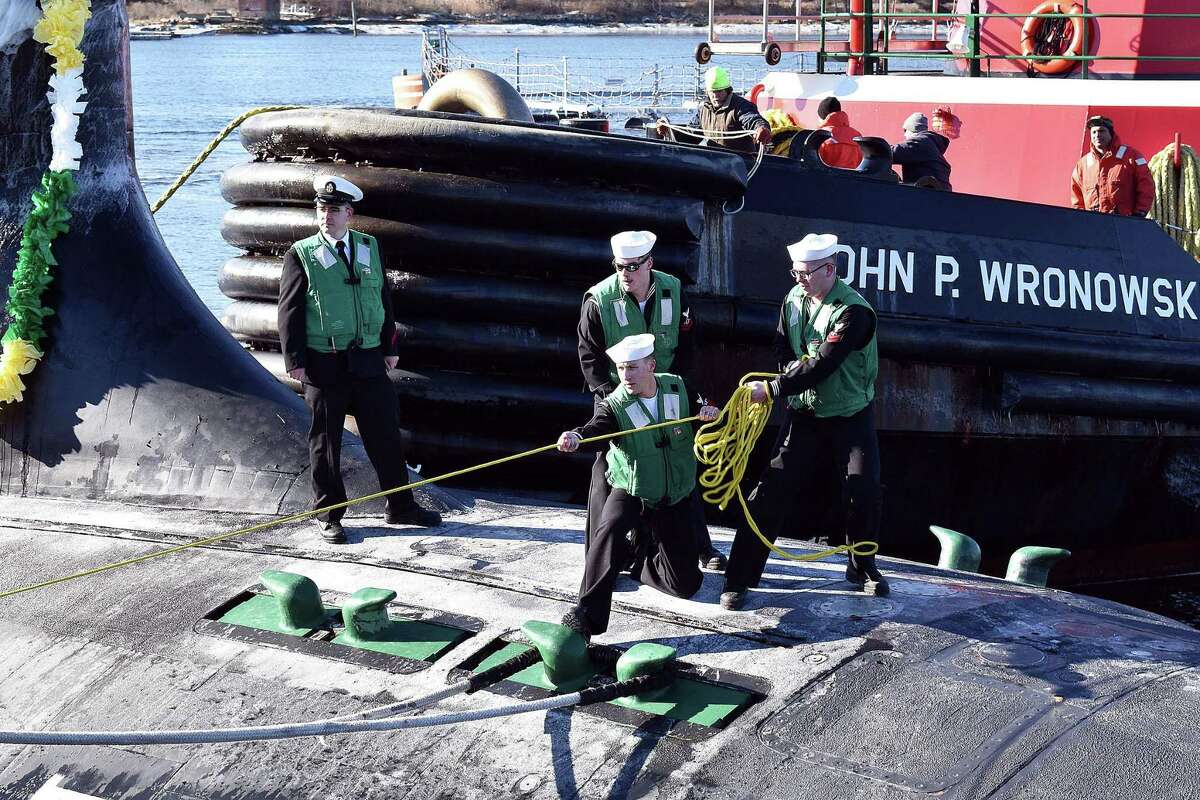 Sailors man the lines as USS North Dakota (SSN 784) returns from deployment to its home port at Naval Submarine Base in New London on Jan. 31.