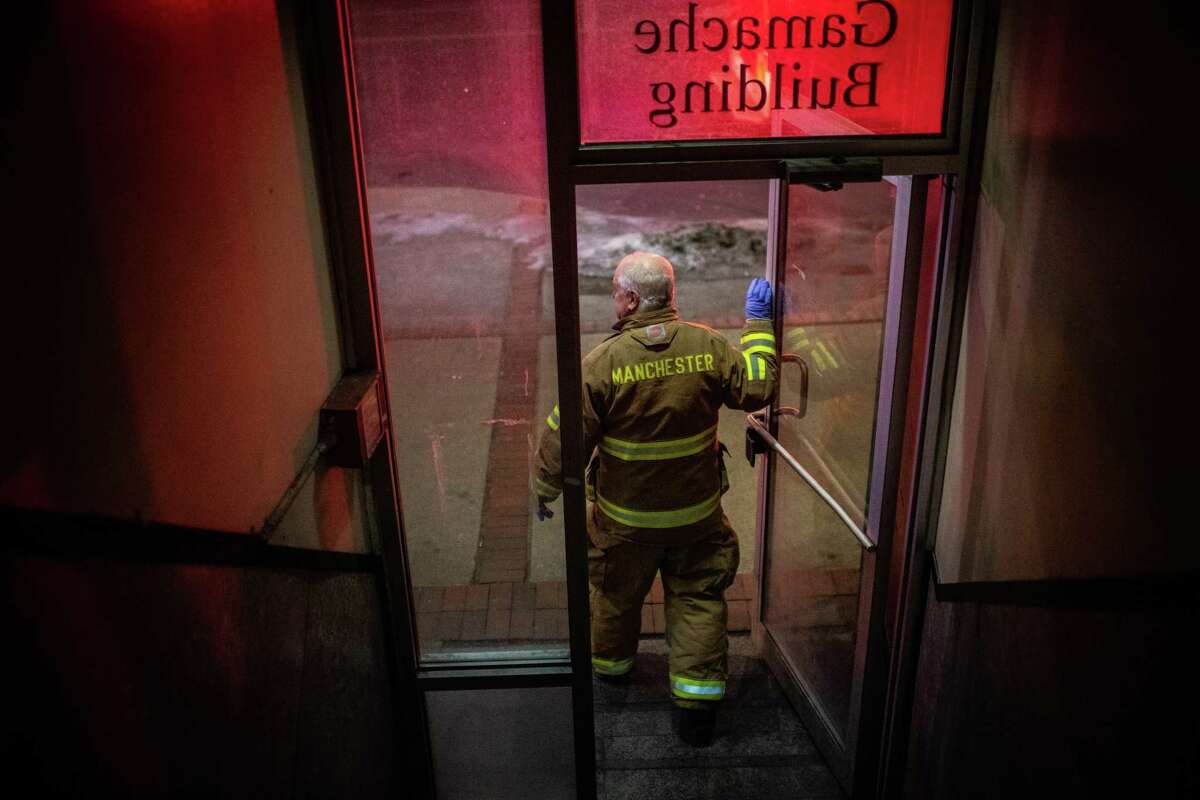 Firefighter Steve Goupil leaves a building after responding to a call on Feb. 8. In 2017, the state had a synthetic-opioid-overdose death rate of approximately 28 per 100,000 people, with Maryland, Massachusetts and Washington, D.C., not far behind. Only West Virginia and Ohio had higher rates.