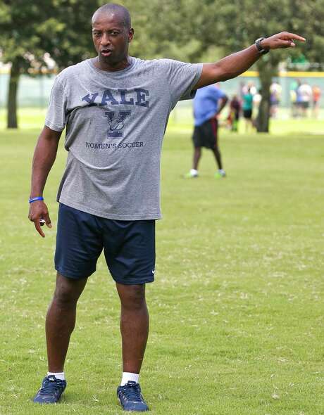 In a September 2016 photo, Yale's women's head soccer Coach Rudy Meredith gives pointers to players during a scrimmage in Ocala, Fla. According to the federal indictments unsealed Tuesday, March 12, 2019, former Yale soccer coach Rudy Meredith put a prospective student who didn’t play soccer on a school list of recruits, doctored her supporting portfolio to indicate she was a player, and later accepted $400,000 from the head of a college placement company. (Doug Engle/Star-Banner via AP) Photo: Doug Engle / Associated Press / Star-Banner