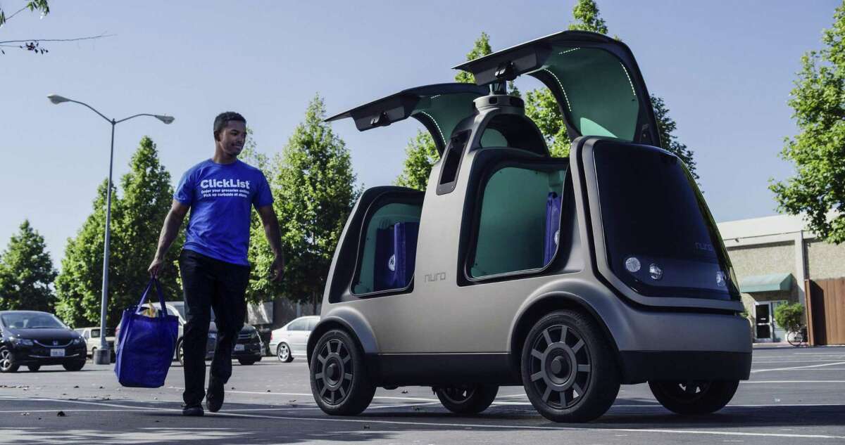This undated image provided by The Kroger Co. shows an autonomous vehicle called the R1. Nuro and grocery chain Kroger are teaming up to bring unmanned delivery service to customers.