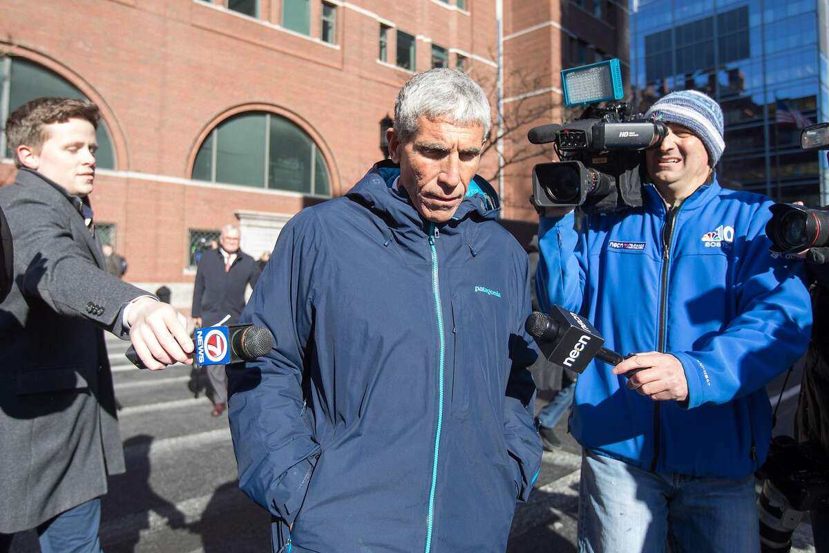 BOSTON, MA - MARCH 12: William "Rick" Singer leaves Boston Federal Court after being charged with racketeering conspiracy, money laundering conspiracy, conspiracy to defraud the United States, and obstruction of justice on March 12, 2019 in Boston, Massachusetts. Singer is among several charged in an alleged college admissions scam involving parents, ACT and SAT administrators and coaches at universities including Stanford, Georgetown, Yale, and the University of Southern California. (Photo by Scott Eisen/Getty Images)