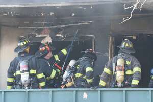 Photos: Firefighters battle flames at Menands apartment building