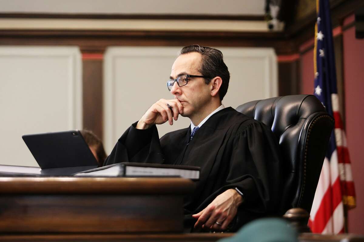 Midland County Circuit Court Judge Stephen P. Carras listens to testimony during the trial of Joel Wallace, who is charged with the murder of his great-aunt, Victoria Kilbourne, on Tuesday, March 12, 2019 at the Midland County Courthouse. (Katy Kildee/kkildee@mdn.net)