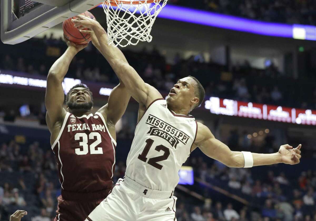 Josh Nebo (32) and Texas A&M struggled offensively against Robert Woodard and Mississippi State on Thursday night.