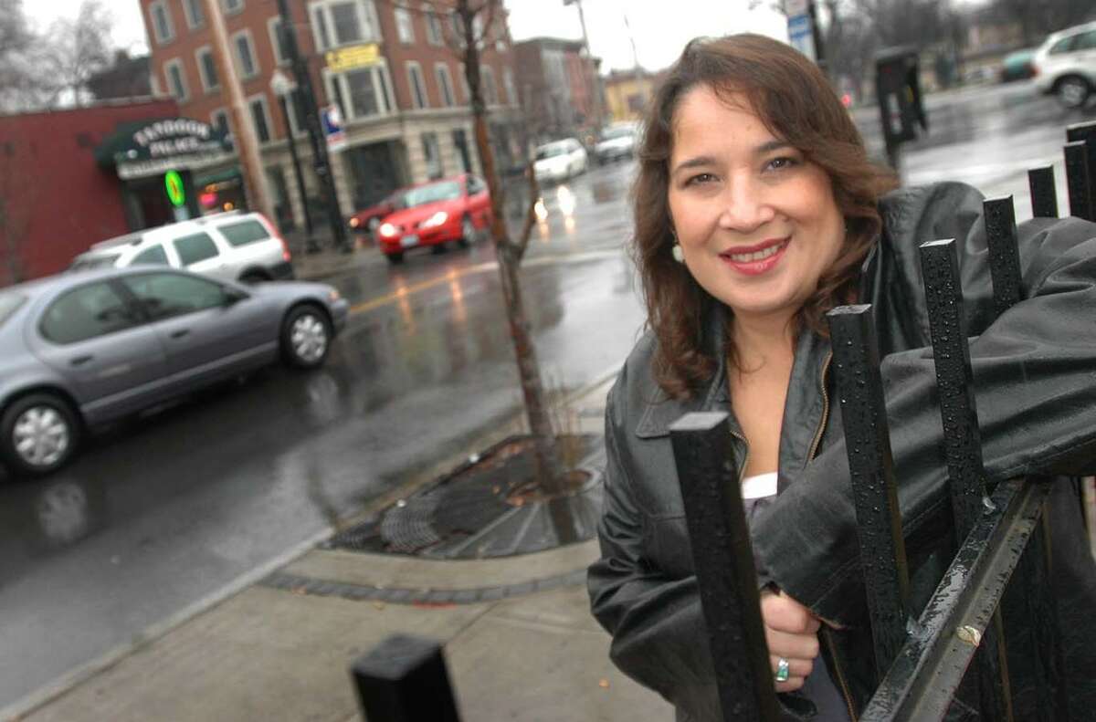 Times Union photo by STEVE JACOBS Albany,NY-- MOTHER JUDGE -- Caroline Isachsen, aka Mother Judge, poses on Lark Street, Thursday, December 29,2005