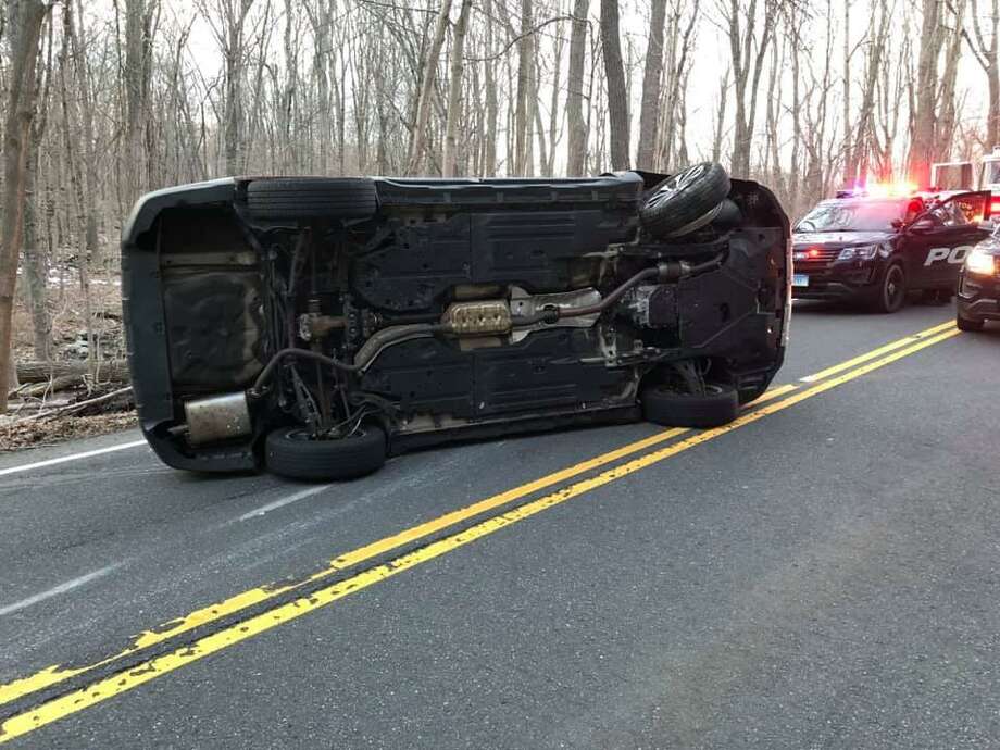 Driver extricated after vehicle flips on its side in Easton