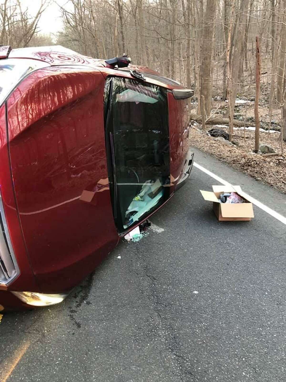 Driver extricated after vehicle flips on its side in Easton