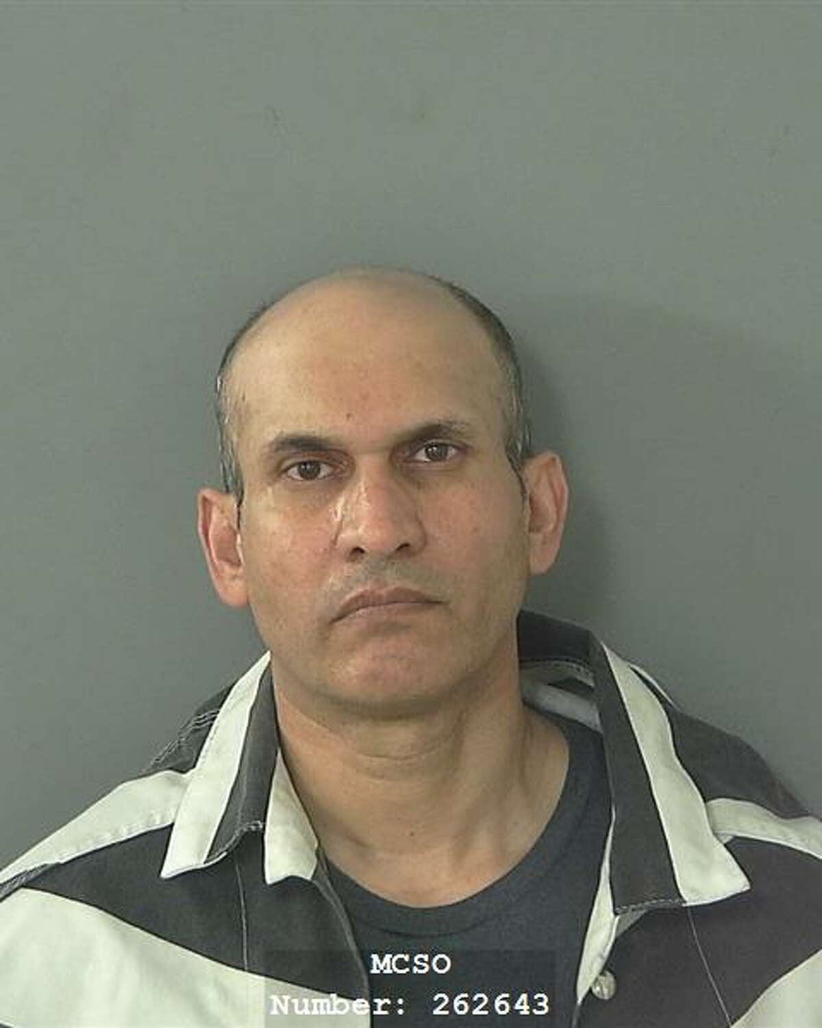 Azhar Siddiq, 45, was arrested and charged with selling alcohol to a minor.