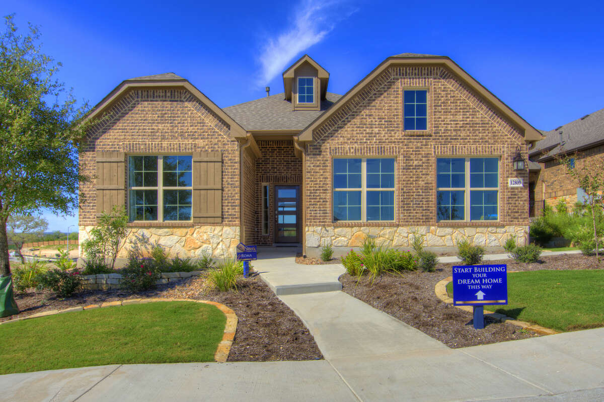 Sitterle's Luxury Garden Home in the exclusive gated section of Weston Oaks