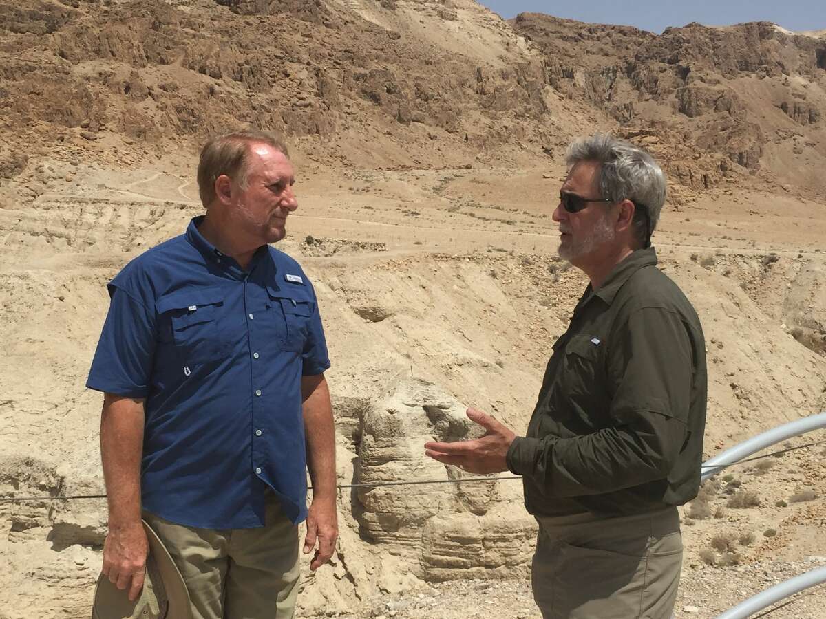 Timothy Mahoney, right, speaks with Dr. Randall Price, former director of Qumran excavations, in “Patterns of Evidence: The Moses Controversy.”