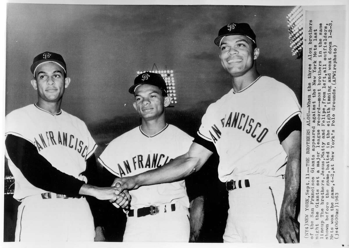 b/w photo of the three Alou brothers - L to R: Jesus, Matty and Felipe - 1963