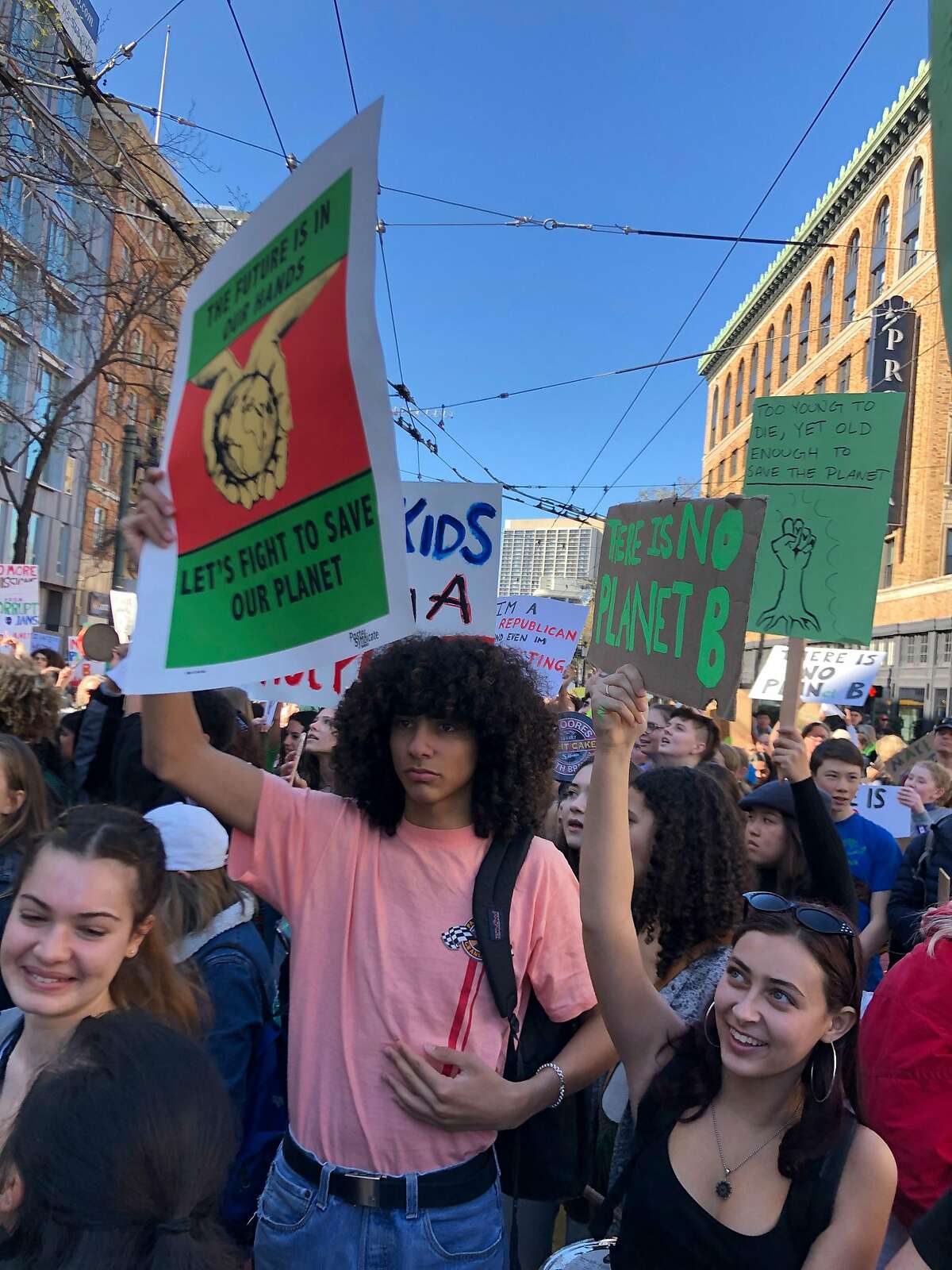 Students walked out of class on Friday, March 15, 2019 to participate in a nationwide coordinated protest against what they perceive as a lack of action on the part of politicians to address climate change. The students were photographed as they marched along Market Street with an ultimate destination of Nancy Pelosi's San Francisco field office.