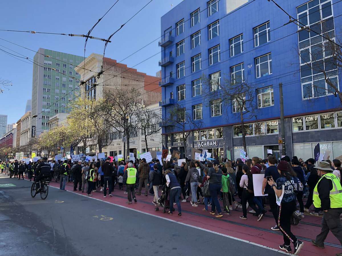 Students walked out of class on Friday, March 15, 2019 to participate in a nationwide coordinated protest against what they perceive as a lack of action on the part of politicians to address climate change. The students were photographed as they marched along Market Street with an ultimate destination of Nancy Pelosi's San Francisco field office.
