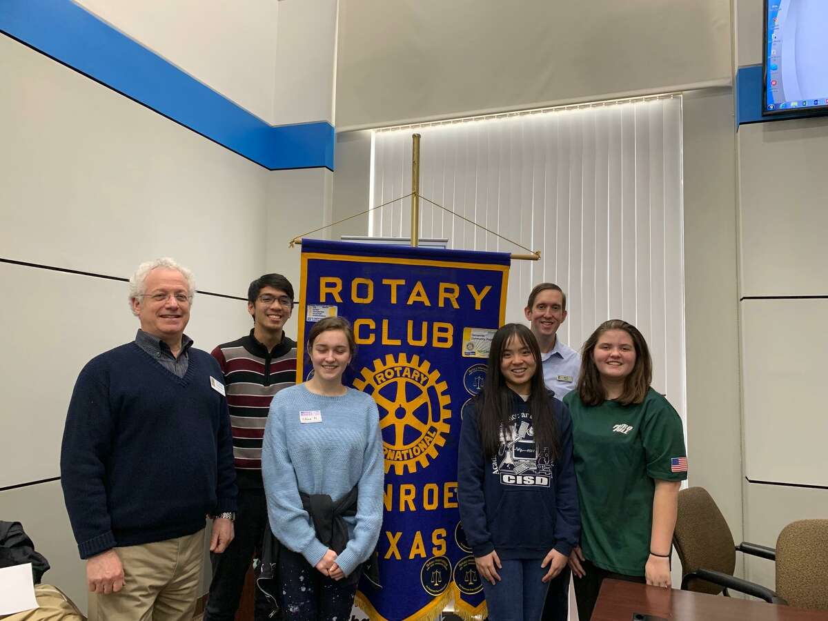 Rotary Club of Conroe President Leland Dushkin and Past President Nick Davis gathered with Conroe High School Students Courtney Stoutes, Melanie Nguyen, Aeronn Sarmiento and Elena Nikolaychuk at the RCC meeting last week. The CHS Students all attended RYLA - Rotary Youth Leadership Awards - in January, sponsored by RCC.