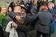 State Rep. Chris Rosario and Bridgeport City Councilman Ernie Newton embrace prior to a moment of silence in memory of state Rep. Ezequiel Santiago at the Morton Government Center in Bridgeporton Friday. Santiago died overnight at the age of 45.