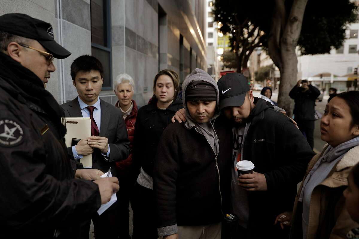 Hay Hov gets hugs and support from other members of the Cambodian community at the entrance to the U.S. Immigration and Customs Enforcement building in San Francisco, Calif., where Hay will to turn himself over to ICE officials on Wednesday, March 13, 2019. . Hov was told to turn himself in after being in the U.S. since he was 6 years old, brought by his parents, but he lost his green card at 19 when he was convicted of a crime. The Trump administration is now cracking down on Cambodians and other Southeast Asian undocumented immigrants.