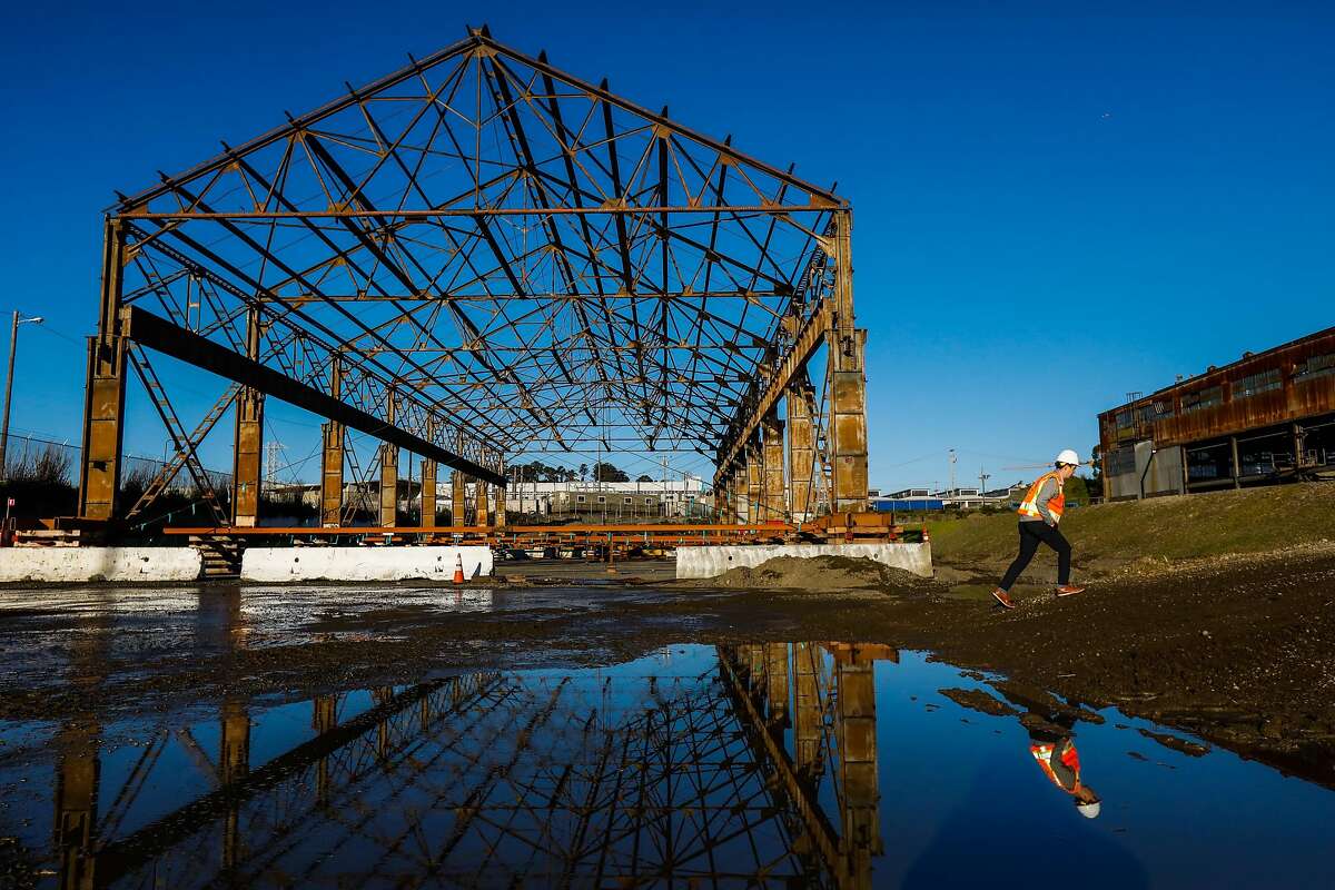 Dominic DiTullio gives a tour of the old industrial buildings that are undergoing renovations at Pier 70 in San Francisco, California, on Wednesday, March 13, 2019.