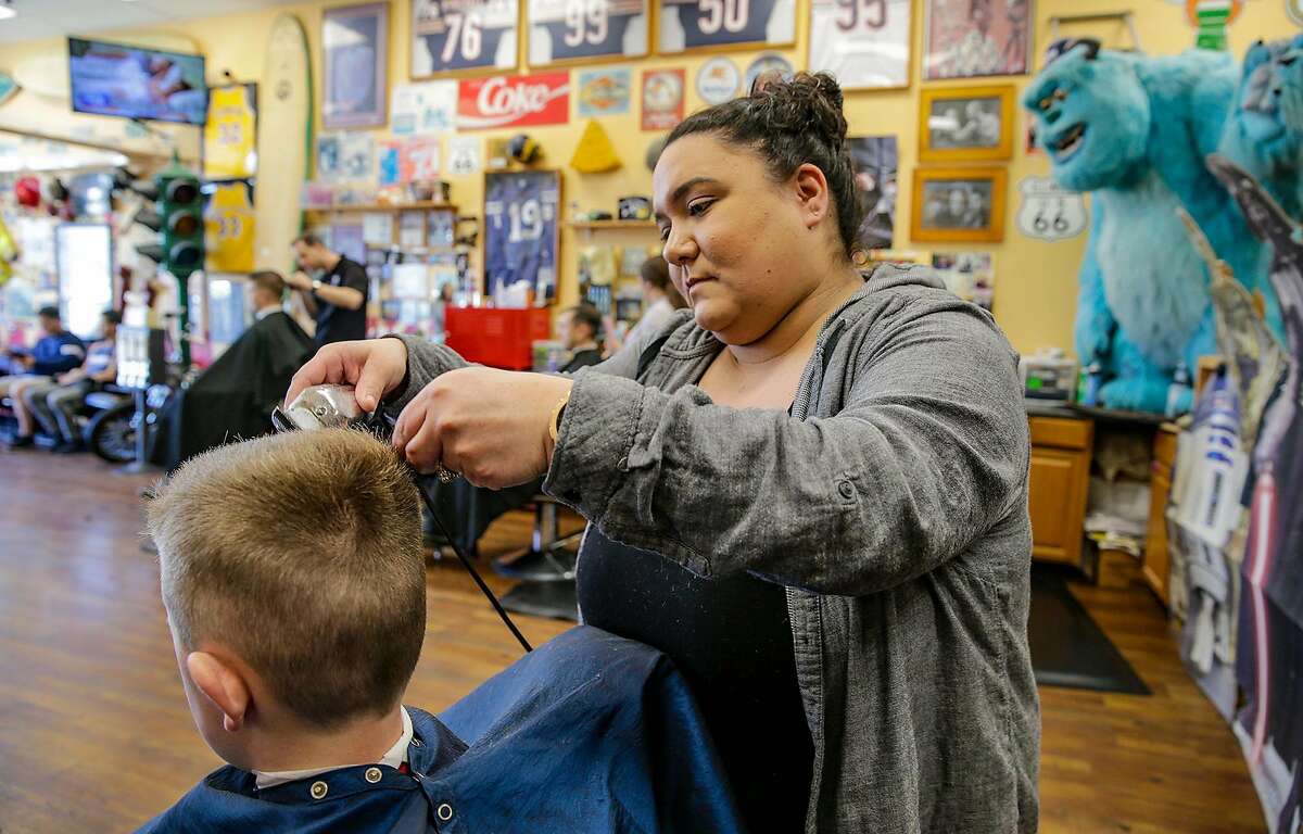 Kristyn Hansen, at Stews Barber Shop in Ladera Ranch, Calif., used to work as a contractor. With the Dynamex court ruling, she was classified as an employee. (Irfan Khan/Los Angeles Times/TNS)