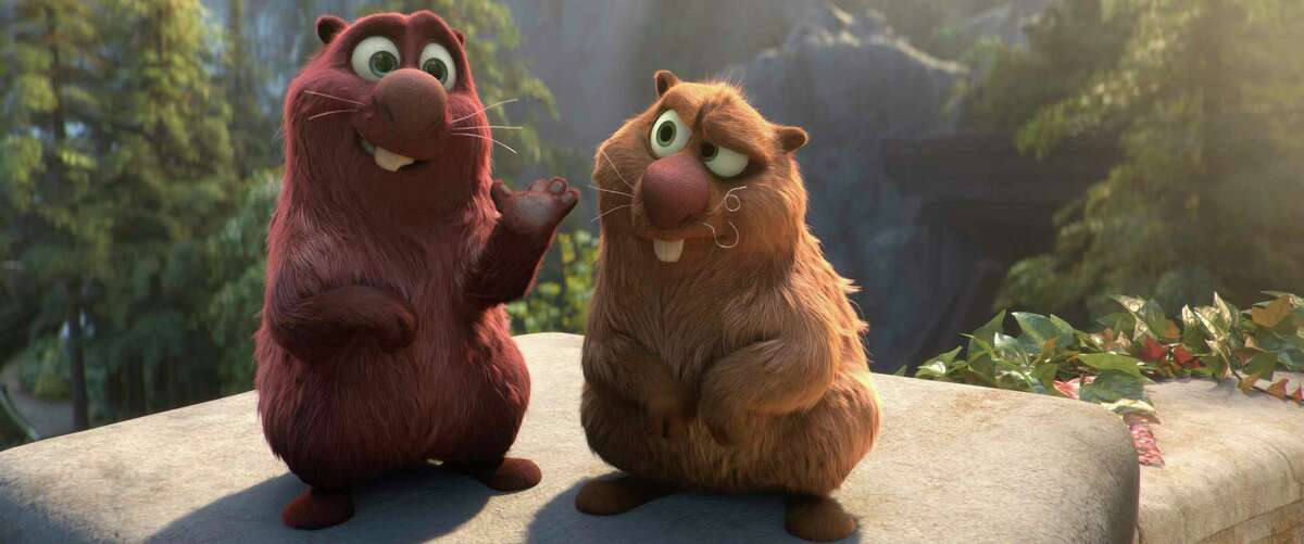This image released by Paramount Animation shows Cooper, voiced by Ken Jeong, left, and Gus, voiced by Kenan Thompson in a scene from the animated film "Wonder Park." (Paramount Animation via AP)