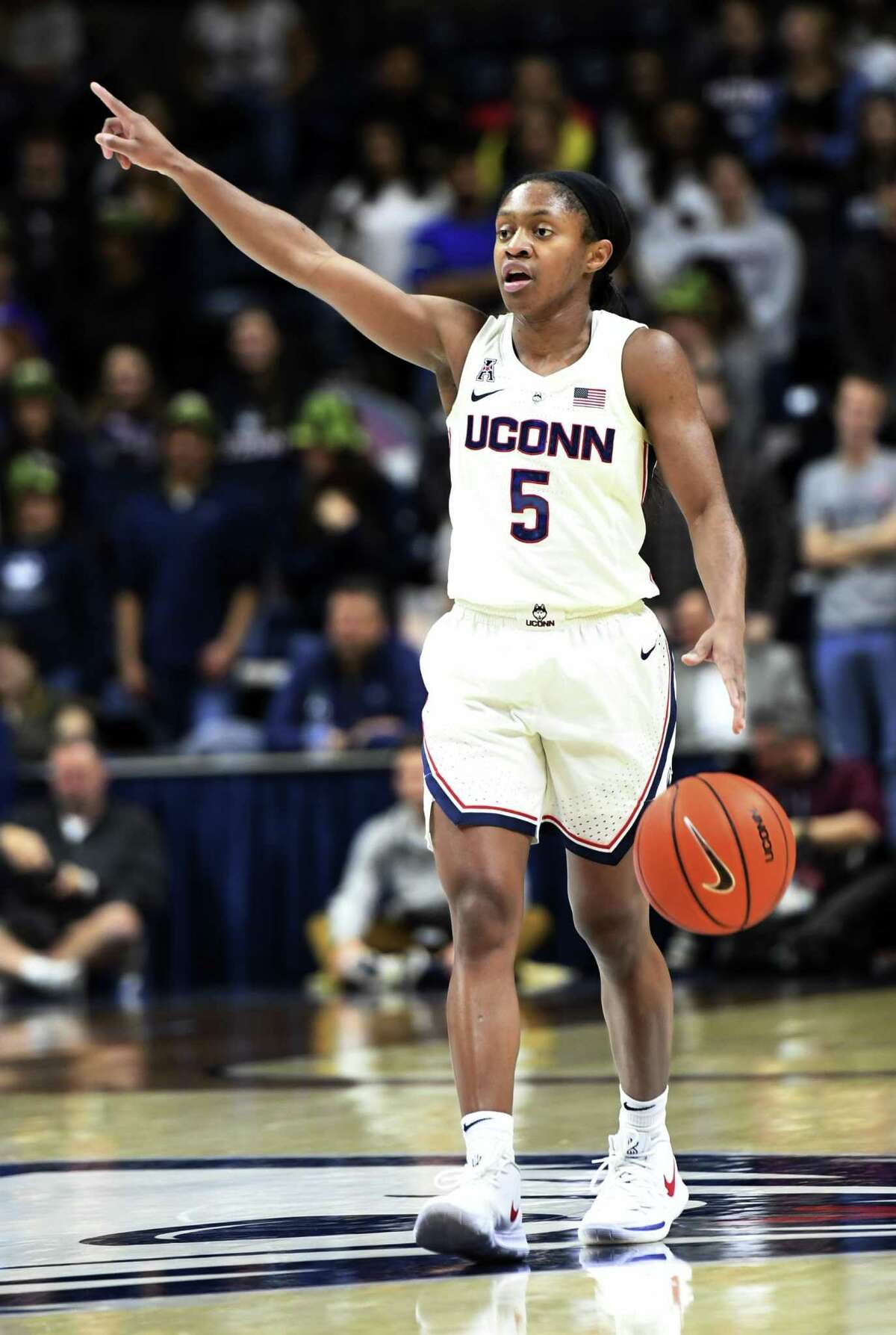 UConn’s Crystal Dangerfield is averaging 13.7 points and a team-best 6.1 assists per game for the Huskies.