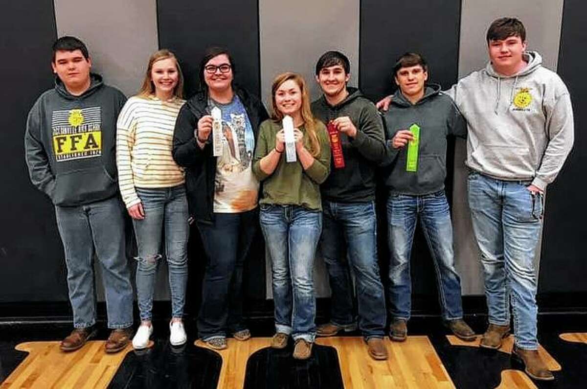 Jacksonville FFA’s poultry team placed third in the Section contest on Feb. 26 in Bluffs. Varsity team members include Garrett Bruns (from left), Katie White, Allison Wheeler, Skylar Bartz and Blake Hadden. Hadden finished second overall and Bartz finished 10th. The greenhand team placed sixth and included Tyler Christian (second from right) and Myles Homann. The poultry team is coached by Phil Bartz.