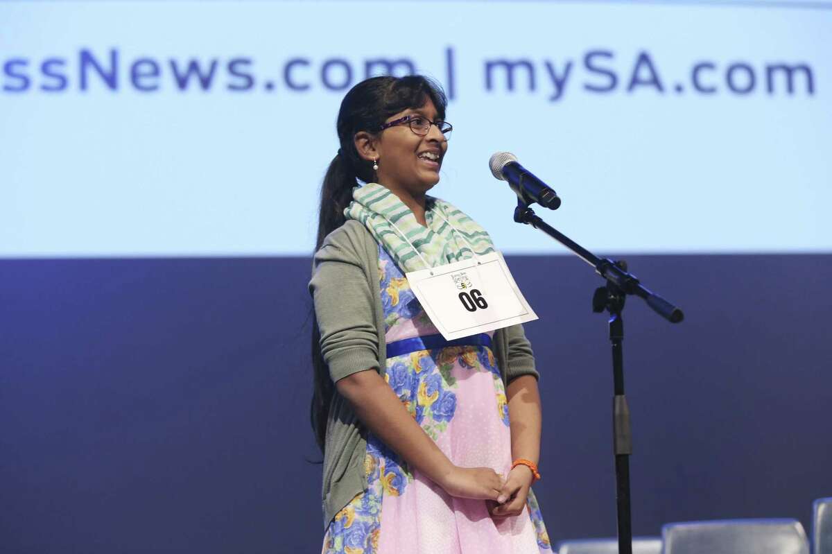 Harini Logan, 10, smiles after wining the 66th annual Express-News Spelling Bee at the University of Texas at San Antonio downtown campus, Sunday, March 17, 2019. Logan, a student at the Montessori School of San Antonio, also won the competition last year.