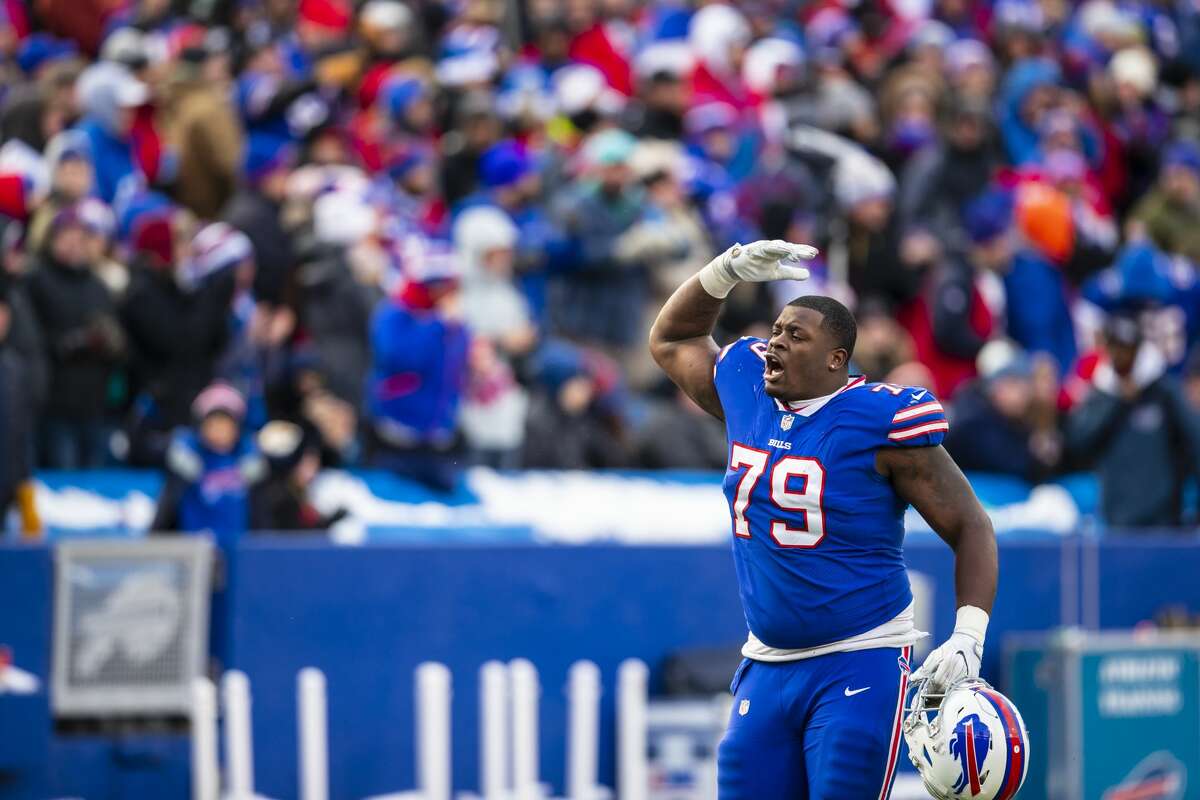 ORCHARD PARK, NY - DECEMBER 30: Jordan Mills #79 of the Buffalo Bills excites the crowd after being ejected during the third quarter against the Miami Dolphins at New Era Field on December 30, 2018 in Orchard Park, New York. Buffalo defeats Miami 42-17. (Photo by Brett Carlsen/Getty Images)
