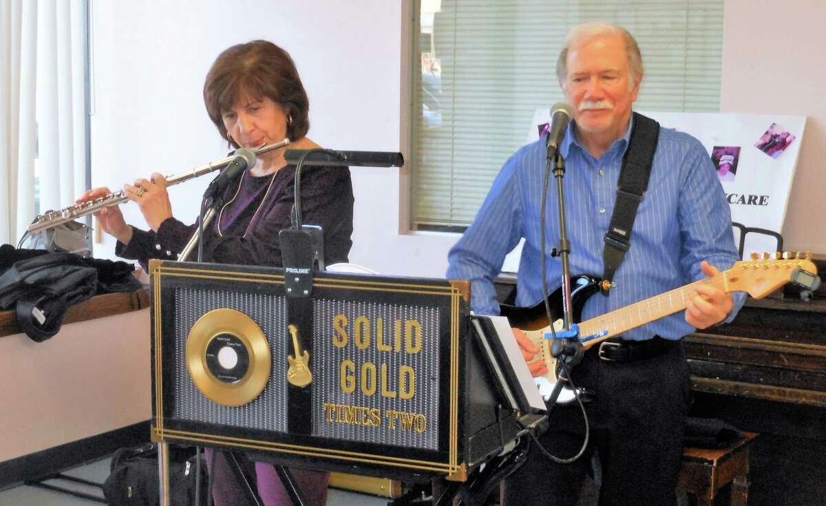 Bob and Josie Schmidt entertained residents at the Almost Home adult day center last month.