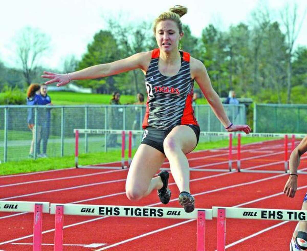 Edwardsville’s Elise Krone competes in the 300-meter hurdles during last year’s Tiger Invite at the Winston Brown Track and Field Complex.