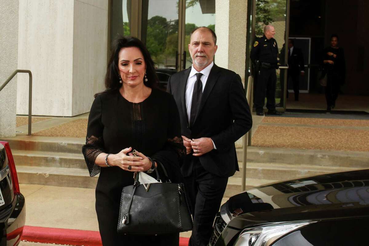 Alicia and Lance Smith leaving Congregation Beth Israel after the services for Houston philanthropist Lester Smith.