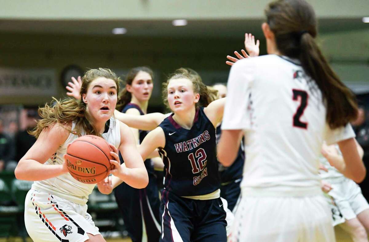CambridgeOs Fiona Mooney , left, passes the ball to teammate Sophie Phillips (2) in the New York State Public High School Athletic Association girls' Class C championship basketball game Saturday, March 16, 2019, in Troy, N.Y. Cambridge won 57-43. (Hans Pennink / Special to the Times Union)