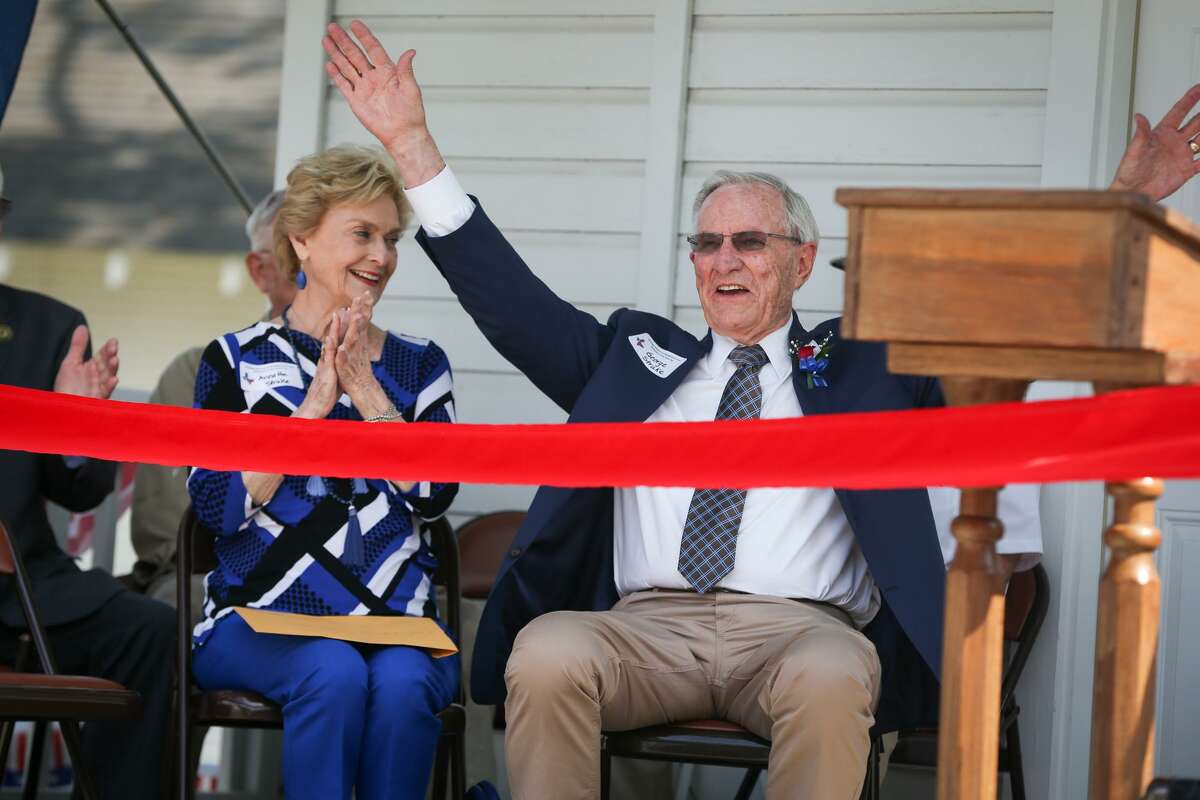 Annette Strake applauds as her husband George reacts to the audience sings him happy birthday during the grand opening of the Strake-Gray Oilfield House on June 10, 2017, at the Heritage Museum of Montgomery County. Strake Jr. spoke about his father in a history series at Sacred Heart Catholic Church on Monday.