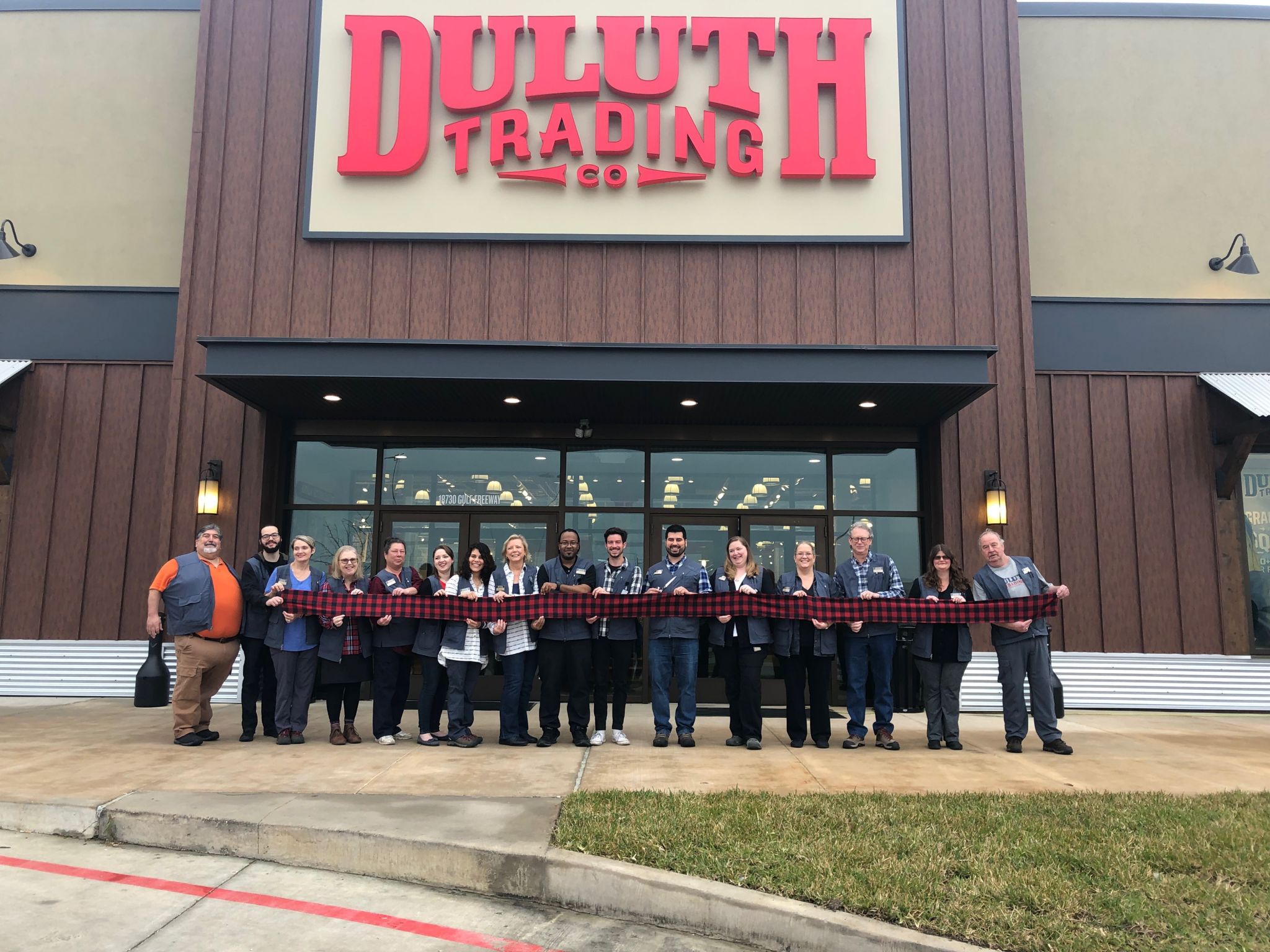 Outdoor clothing store enters area market swinging an ax