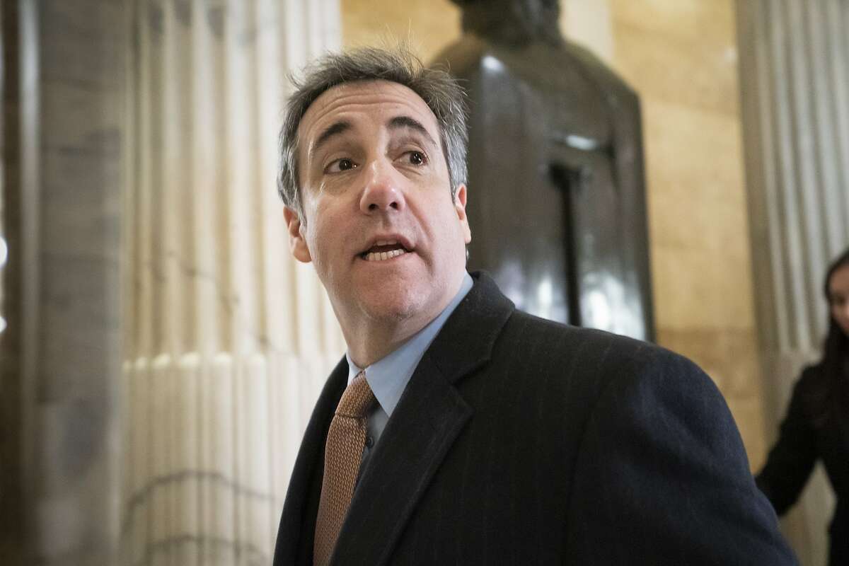 FILE - In this March 6, 2019 file photo, Michael Cohen, President Donald Trump's former lawyer, returns to testify on Capitol Hill in Washington. Prosecutors are scheduled to publicly release documents on Tuesday, March 19, 2019 related to the search warrant that authorized last year's FBI raids on Cohen's home and office in New York. (AP Photo/J. Scott Applewhite, File)