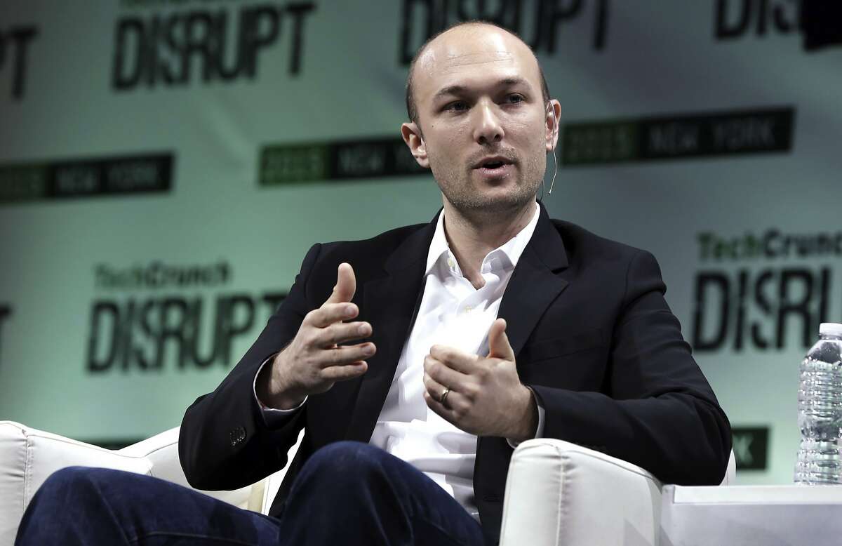 FILE - In this May 5, 2015, file photo, Lyft co-founder Logan Green speaks at TechCrunch Disrupt NY event, in New York. Ride-hailing giant Lyft is releasing financial details about the company in a federal filing before it begins selling its stock to the public. (AP Photo/Richard Drew, File)