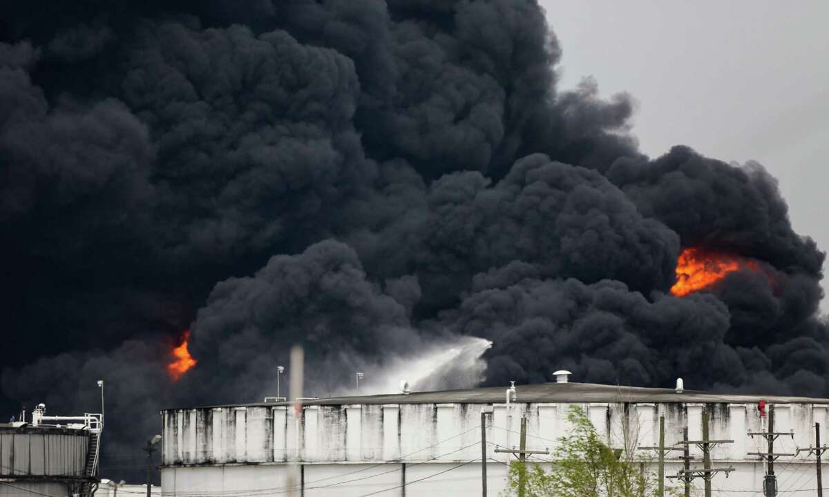Firefighters continue to battle the petrochemical fire at Intercontinental Terminals Company, which grew in size due to a lack of water pressure last night Tuesday, March 19, 2019, in Deer Park, Texas.