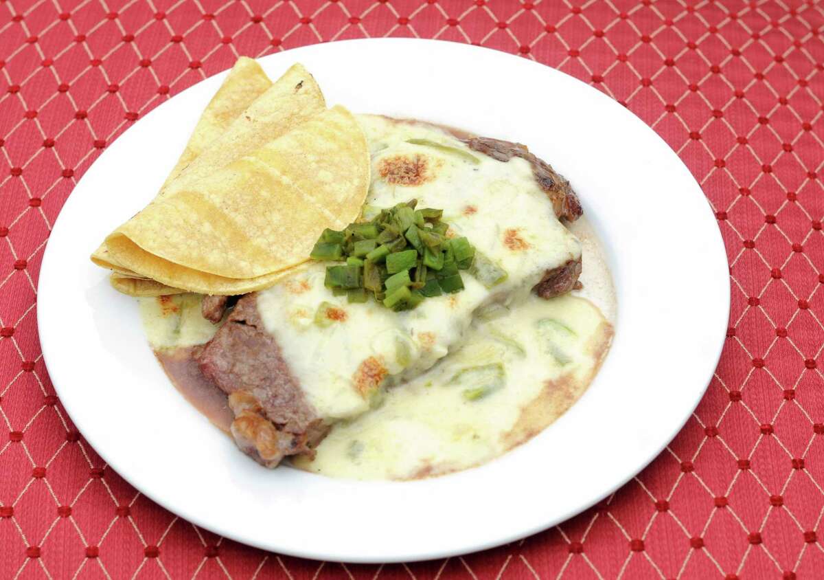 The story behind the puro San Antonio steak con queso and how to make it