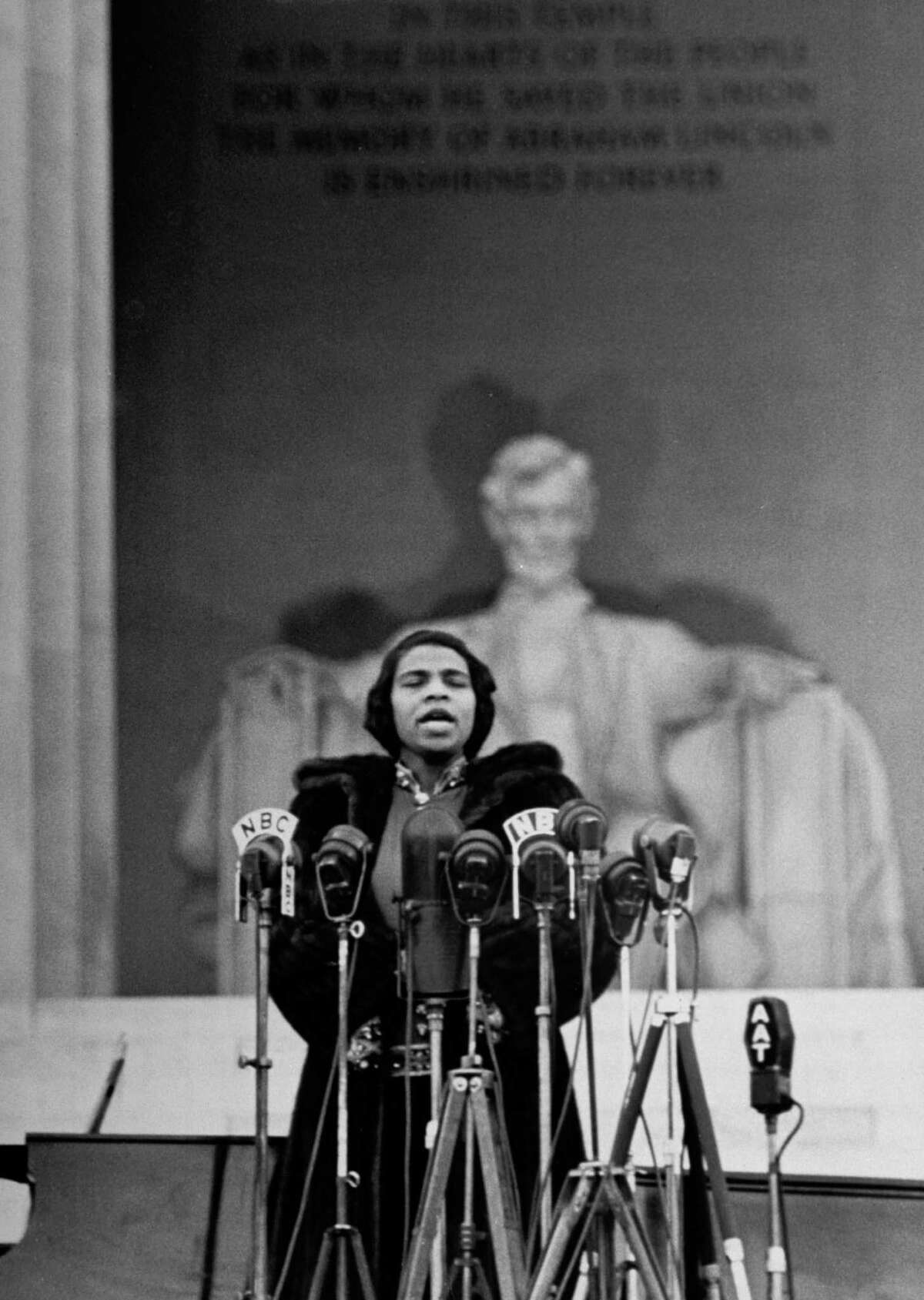 Singer Marian Anderson, denied use of a DAR (Daughters of the American Revolution) hall because of her race, gives an Easter concert at the Lincoln Memorial.