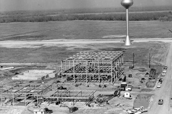 From the Houston Chronicle archives, February 1963: After months of expensive damage and site preparation work at the Clear Lake site of the Manned Spacecraft Center, the buildings are, at last, going up. The water tower marks the center of the site which is expected to have a daily working population of 10,000 persons by the end of 1965.