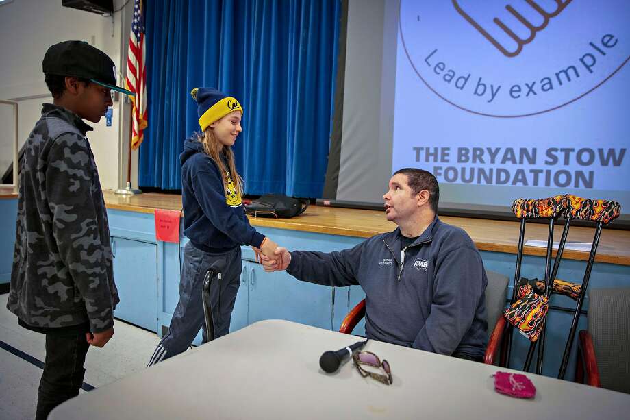 5th grade students Zoe Cohen, 11 and Charles Booker meet and chat with Bryan Stow after delivering his anti-bullying speech at the Mary Farmar Elementary School in Benicia, California, USA 1 Mar 2019. Stow is the Giants? fan who suffered a severe brain injury during assault after Opening Day game at Dodger Stadium in 2011. (Peter DaSilva/Special to The Chronicle) Photo: Peter DaSilva / Special To The Chronicle