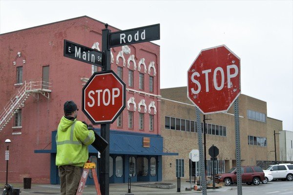 Midland Rd Street Sign Stop signs, street names getting installed in downtown Midland