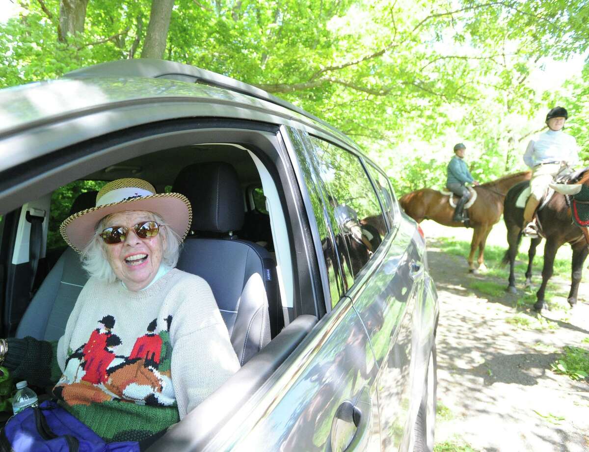 At left, Greenwich Riding and Trails Association member Norma Bartol at Nichols Preserve in Greenwich on May 29, 2014, with some equine friends.