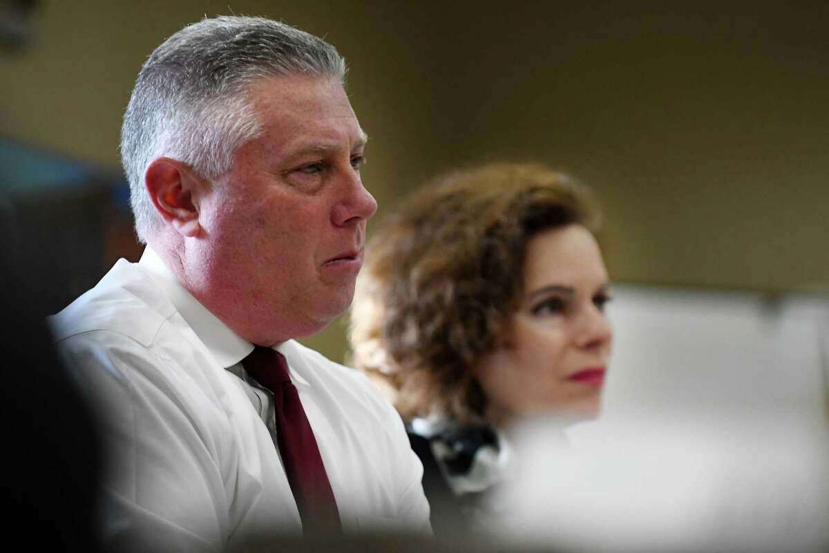 Assemblymember John T. McDonald III, left, and Assemblymember Patricia Fahy, right, listen to representatives from the Capital Region business community during a roundtable to discuss the potential impacts of marijuana legalization on Thursday morning, March 21, 2019, at the Capital Region Chamber in Colonie, N.Y. (Will Waldron/Times Union)